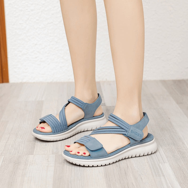 Sporty women's blue soft sandals with Velcro, featuring cushioned support, PU leather, and TPR outsole, ideal for comfort and style.